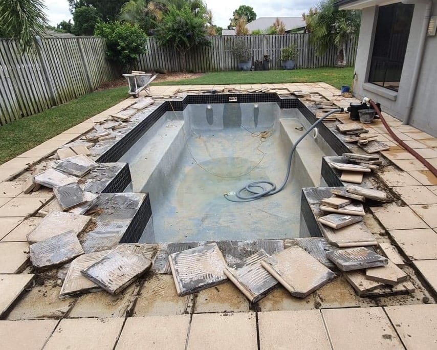 Pool renovation in progress — coping removal